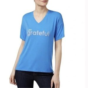 Peace Love World Mia Grateful
Graphic T-Shirt